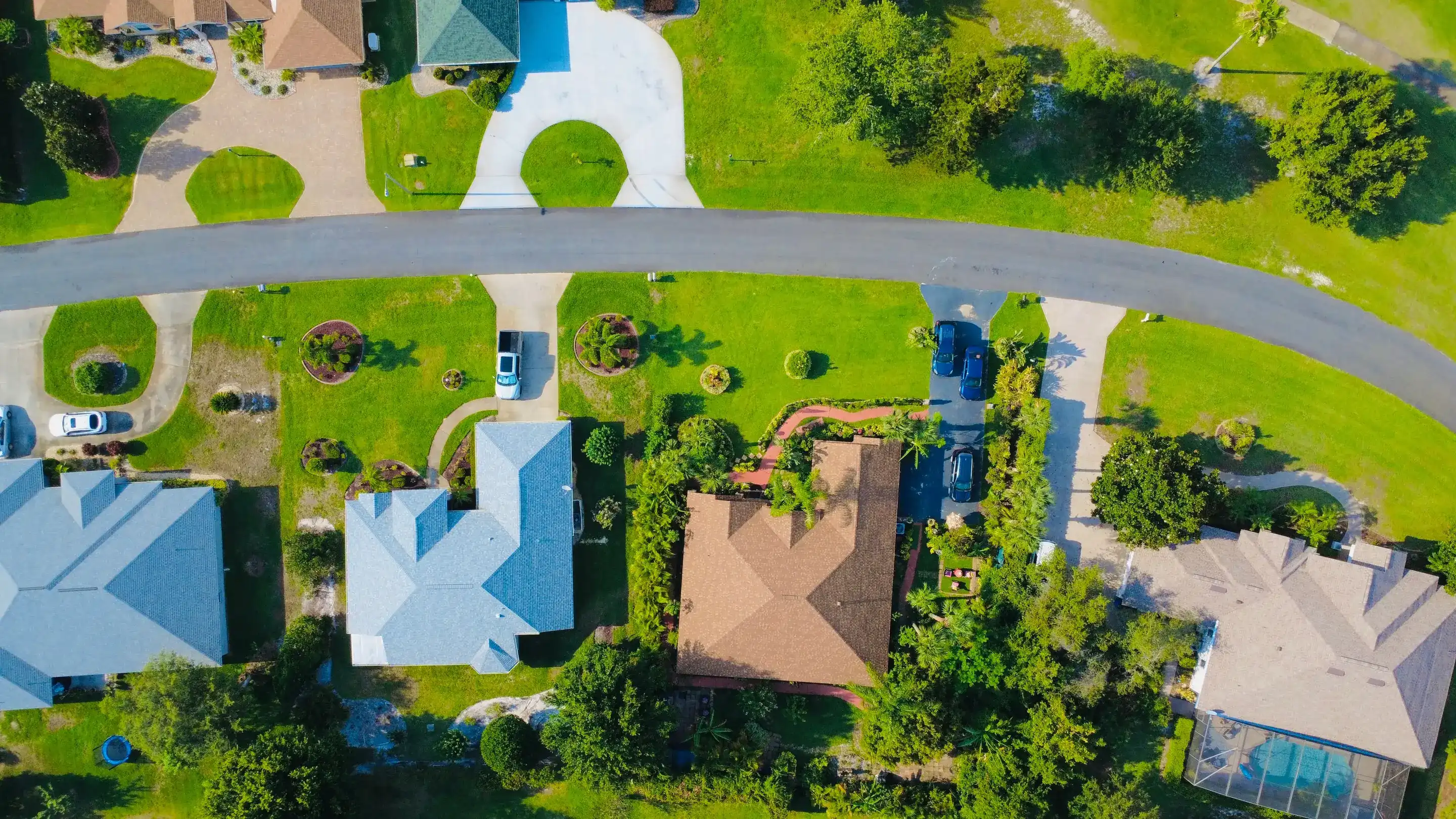 Aerial view of a suburban Florida neighborhood with green lawns, representative of Palm Bay, FL's 1980s subdivisions